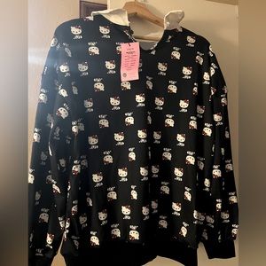 Shein + Hello Kitty black long sleeve top with hello kitty’ graphic.